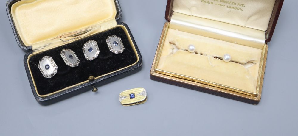 A pair of 14ct gold and sapphire cufflinks, gross 11.3 grams, a similar unmarked clip, gross 4.8 grams and a pair of 10k gold and pearl